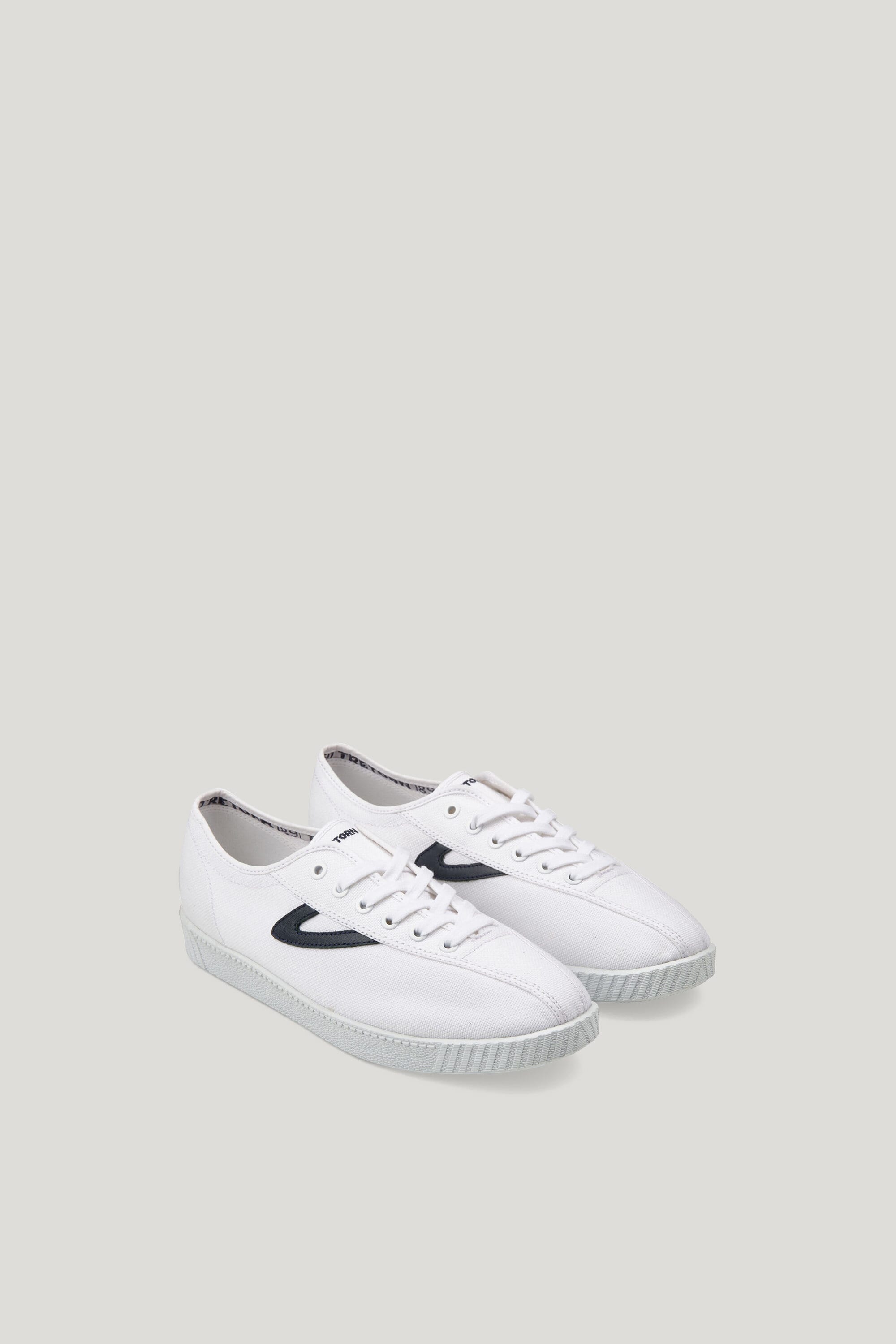 Nylite Sneakers by Tretorn for men and women in the colour white and black